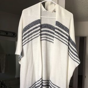 Poncho type sweater.